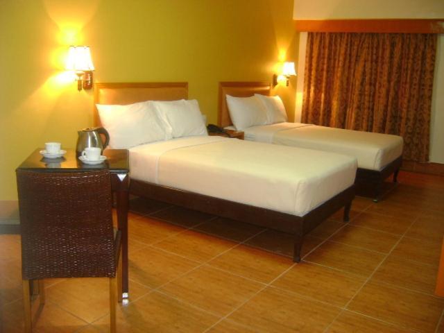 Pamulinawen Hotel Laoag Quarto foto