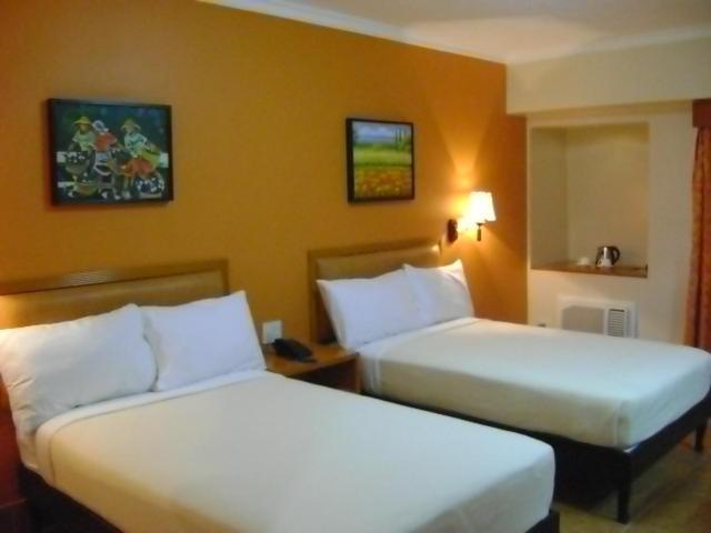 Pamulinawen Hotel Laoag Quarto foto